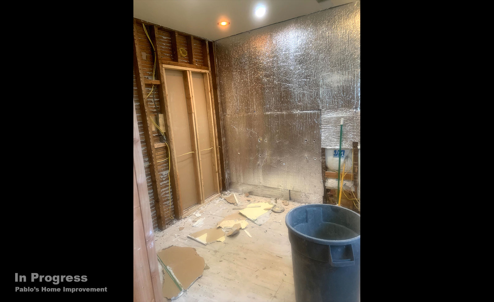 bathroom-renovation-teal-tile-dark-floor-inprogress1