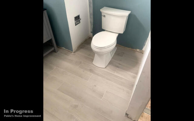 bathroom-renovation-white-tile-light-floor-inprogress1