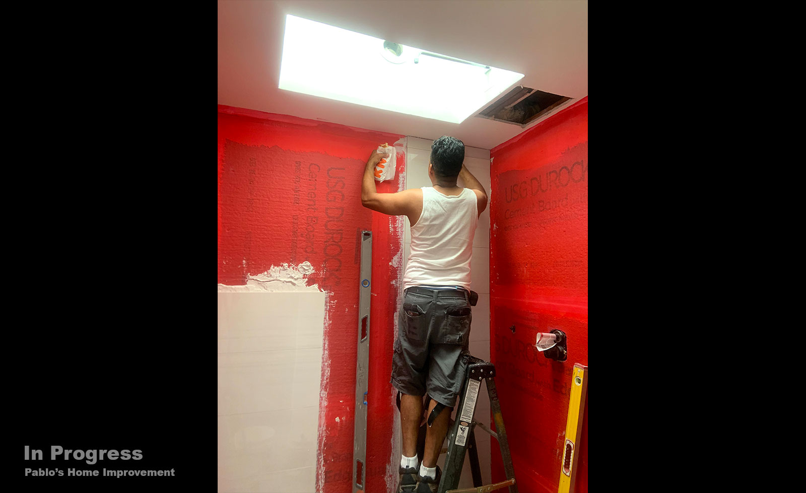 bathroom-renovation-white-tile-light-floor-inprogress3