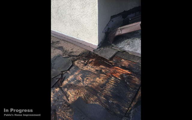 roof damage due to water by downspout