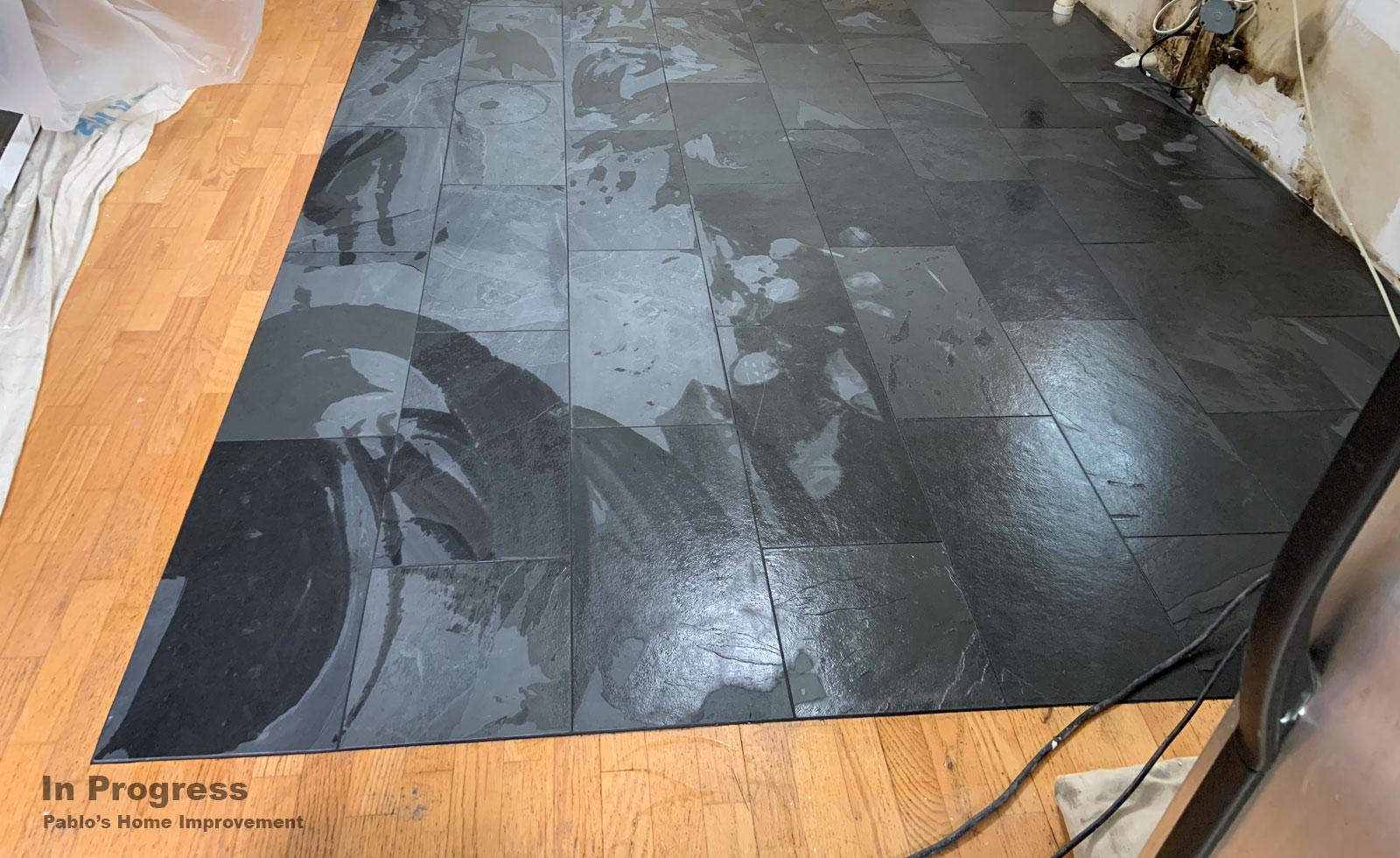 kitchen_black_tile_floor_in_progress